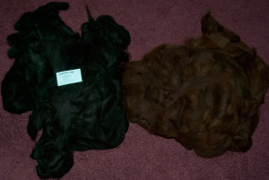 Pure Alpaca. 1.1 lbs of the black, and 1.3 lbs of the chocolate. Natural Colors: Not dyed. $35 / lb (only charged for 2 lbs total)