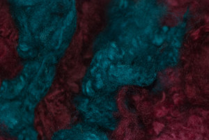 Romney dyed locks. Teal and Cranvberry. $11.75 for just under 6 oz.